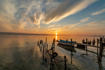 lonely boat at suset
