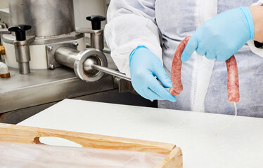 production of sausages in meat production