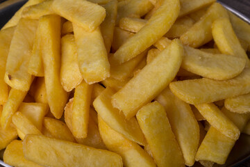 French fries close-up photograph. Flat food backgrounds.