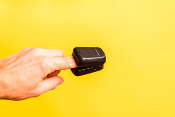 Oxygen saturation is measured with an oximeter, placed on the patient's finger.