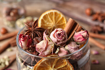 Aroma potpourri with different spices in jar, closeup view