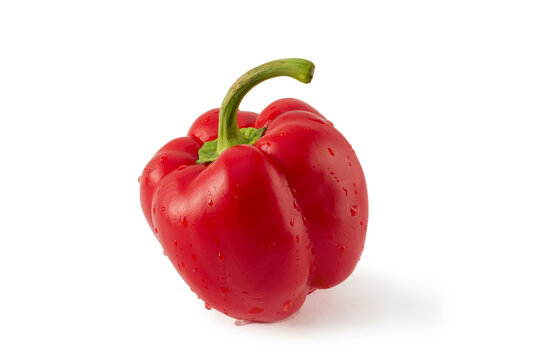 Red Bulgarian, bell pepper on a white background. Horizontal photo, close-up.