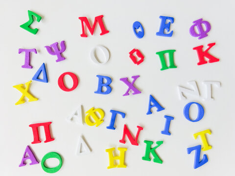 Colorful greek alphabet isolated on white background close up