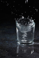 A glass with pure water splash