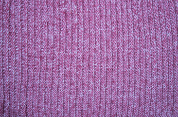 Pink knitted pattern. Knitted textures for wallpaper and background