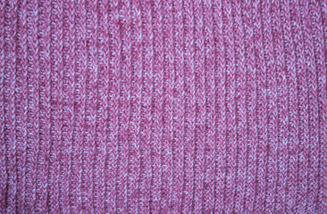 Obraz premium Pink knitted pattern. Knitted textures for wallpaper and background