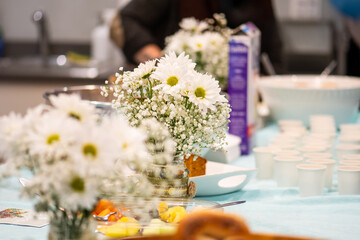 White Flower centerpiece on a brunch buffet table