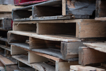 Fototapeta na wymiar detail shot of a Stack of wooden pallets 