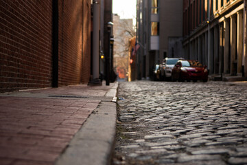 Cobblestone Street in a City at Sunset