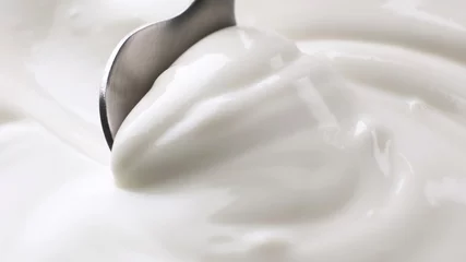 Fotobehang Sour cream close up, greek yogurt with spoon © xamtiw
