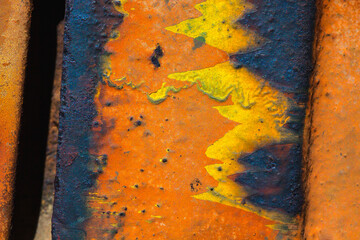 Details of rust and paint on metal.