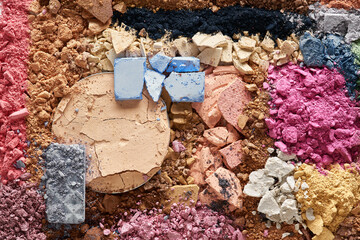 Broken eyeshadows in trendy shades isolated on white background