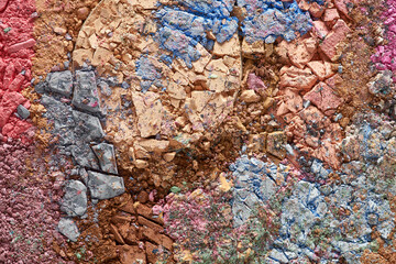 Broken eyeshadows in trendy shades isolated on white background