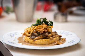 Instructional image for how to cook Vegan Mushroom Polenta