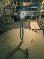 Steel chain hook chain hoist. industrial background. Crane load hook.