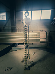 Steel chain hook chain hoist. industrial background. Crane load hook.