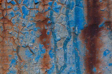 Details of rust and paint on metal.