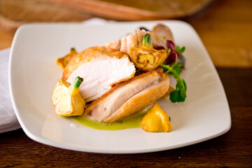 Chicken breast. Chicken pan seared to a crispy golden brown in brown butter and served with fresh organic vegetables: carrots, Brussels sprouts and green beans. Classic American restaurant favorite.