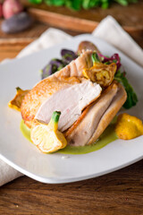Chicken breast. Chicken pan seared to a crispy golden brown in brown butter and served with fresh organic vegetables: carrots, Brussels sprouts and green beans. Classic American restaurant favorite.