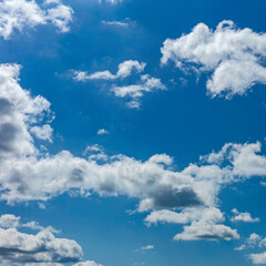 Beautiful blue sky with white clouds as a natural background.