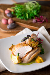 Chicken breast. Chicken pan seared to a crispy golden brown in brown butter and served with fresh organic vegetables: carrots, Brussels sprouts and green beans. Classic American restaurant favorite.