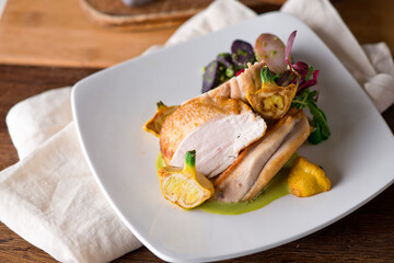Chicken breast. Chicken pan seared to a crispy golden brown in brown butter and served with fresh organic vegetables: carrots, Brussels sprouts and green beans. Classic American restaurant favorite.