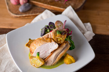 Chicken breast. Chicken pan seared to a crispy golden brown in brown butter and served with fresh organic vegetables: carrots, Brussels sprouts and green beans. Classic American restaurant favorite.