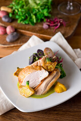 Chicken breast. Chicken pan seared to a crispy golden brown in brown butter and served with fresh organic vegetables: carrots, Brussels sprouts and green beans. Classic American restaurant favorite.