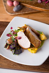 Chicken breast. Chicken pan seared to a crispy golden brown in brown butter and served with fresh organic vegetables: carrots, Brussels sprouts and green beans. Classic American restaurant favorite.