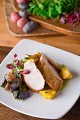 Chicken breast. Chicken pan seared to a crispy golden brown in brown butter and served with fresh organic vegetables: carrots, Brussels sprouts and green beans. Classic American restaurant favorite.