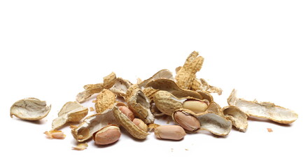 Shelled and unshelled peanuts pile isolated on white background