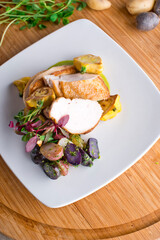Chicken breast. Chicken pan seared to a crispy golden brown in brown butter and served with fresh organic vegetables: carrots, Brussels sprouts and green beans. Classic American restaurant favorite.