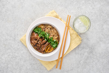 Asian noodles with beef and vegetables.