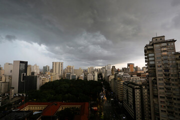 Dark clouds prior to a heavy rain are seen in downtown Sao Paulo, Brazil, over the Republic square.