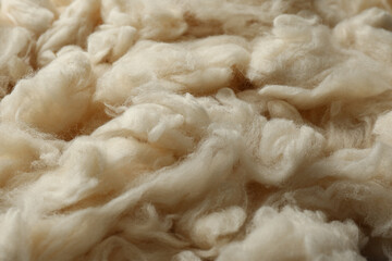 Clean white wool texture as background, closeup