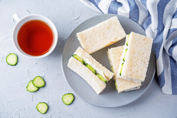 Cucumber cream cheese sandwiches on the plate