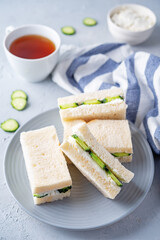 Cucumber cream cheese sandwiches on the plate