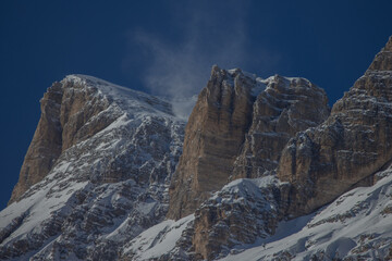 Detail of rock formations in mountains above the Tofana ski piste above Cortina d'Ampezzo in Italy on a clear winter day