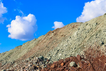 View of slag heaps of iron ore quarry. Mining industry