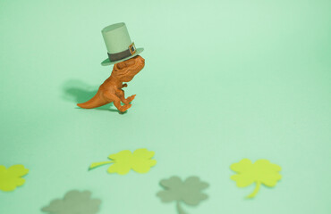 Dinosaur leprechaun in green hat. Saint Patrick's Day banner. Funny greeting card. Copy space