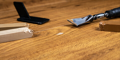 repair of damage to laminate and parquet with wax