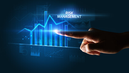 Hand touching RISK MANAGEMENT button, business concept