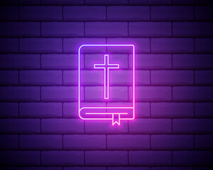 Holy Bible neon light icon. Glowing sign. Vector illustration isolated on brick wall backogrund