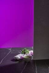 purple summer roll on stone surface with purple background