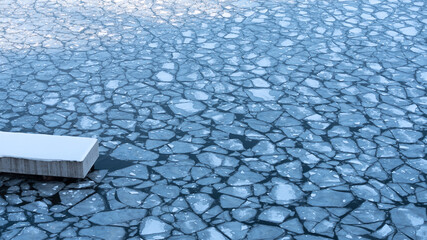 Large chunks of ice blocks forming a beautiful pattern, after the icebreaker ship passed by and crushed the densely packed ice. This is a necessity so that the sea traffic can continue in Stockholm. © Anders
