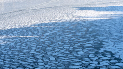 Large chunks of ice blocks forming a beautiful pattern, after the icebreaker ship passed by and crushed the densely packed ice. This is a necessity so that the sea traffic can continue in Stockholm. © Anders