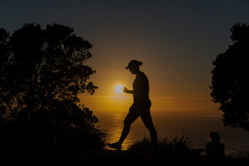 View into sun from summit of Mount Maunganui