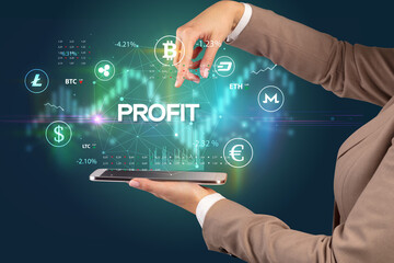 Close-up of a touchscreen with PROFIT inscription, business opportunity concept