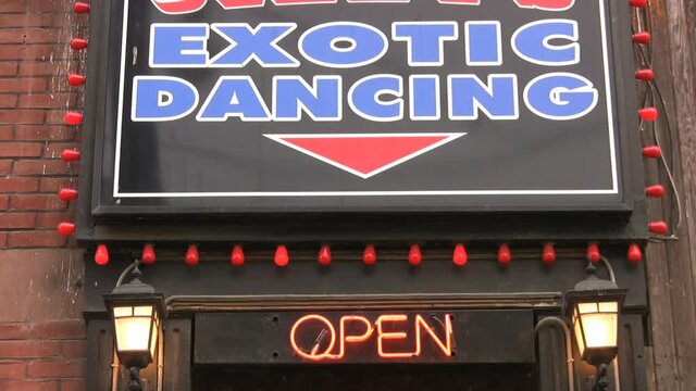 Exotic Dancing sign. Sign at entrance of strip club. Toronto, Canada.
