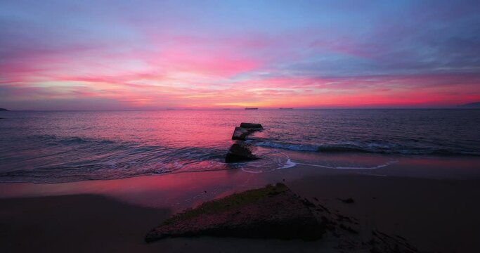 Colorful epic ocean beach sunrise, 4K video